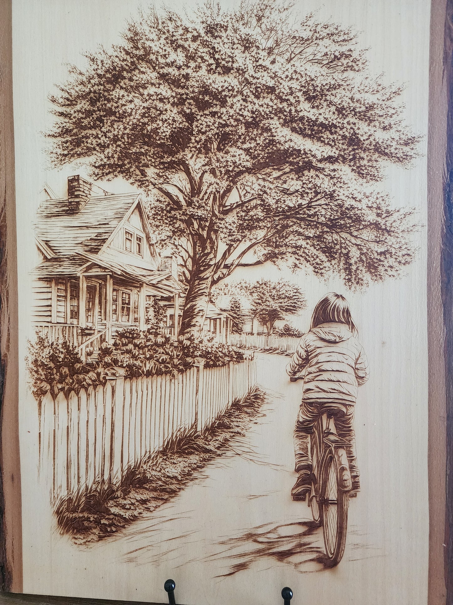 Small Town Peaceful Life Laser Engraving on Live Edge Wood – Girl on Bicycle Rustic Wall Art