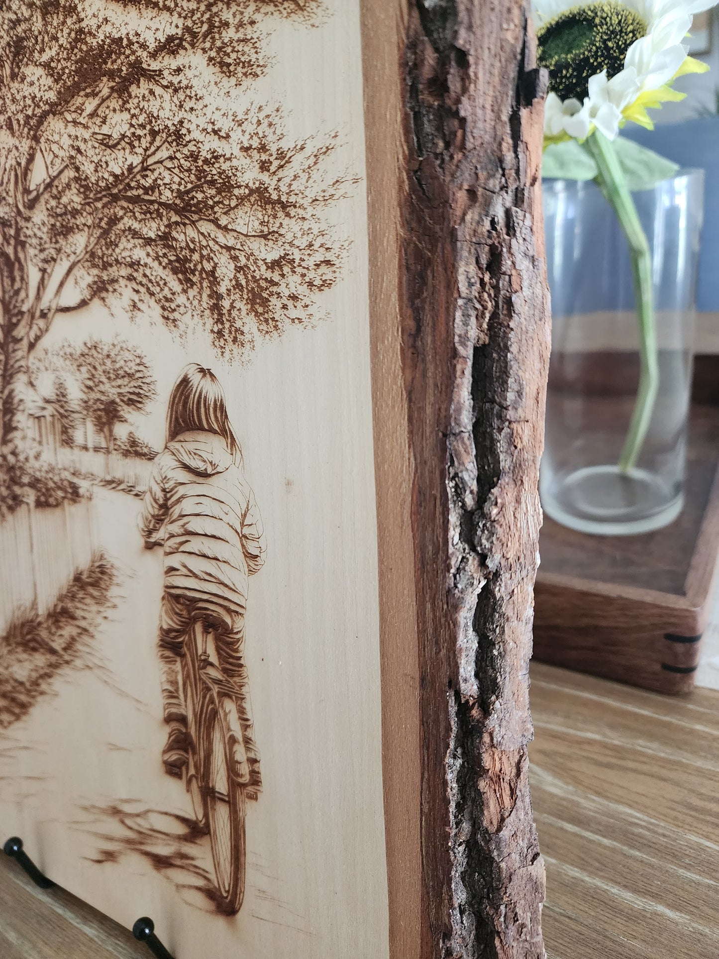 Small Town Peaceful Life Laser Engraving on Live Edge Wood – Girl on Bicycle Rustic Wall Art