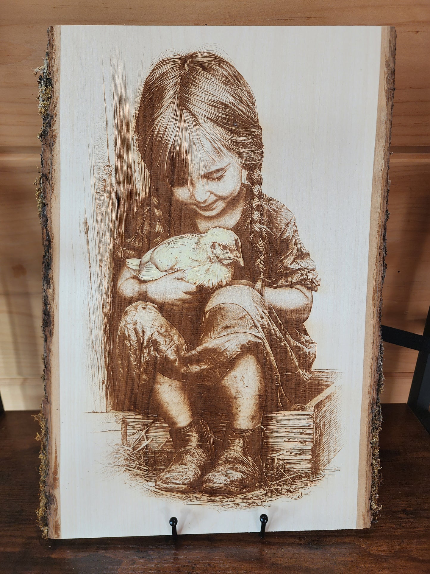 Little Girl with Baby Chick – Laser-Engraved Live Edge Basswood Farmhouse Art